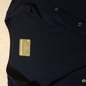 NWOT Skechers navy blue scrub jacket size Large. Never worn.